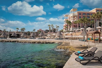 Sun loungers, beach umbrellas, beach towels