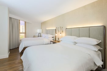 Suite, Multiple Beds | Premium bedding, in-room safe, desk, iron/ironing board