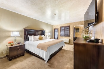 Suite, 2 Queen Beds, Balcony | Pillowtop beds, in-room safe, desk, laptop workspace