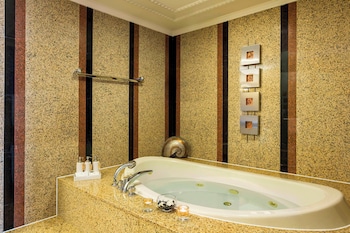 Presidential Suite, 1 King Bed, River View | Bathroom | Deep soaking tub, free toiletries, hair dryer, bathrobes