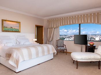 Presidential Suite, River View (Suite) | Minibar, in-room safe, desk, blackout drapes