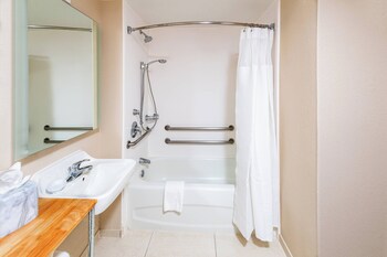 Suite, Multiple Beds | Bathroom | Combined shower/tub, free toiletries, hair dryer, towels