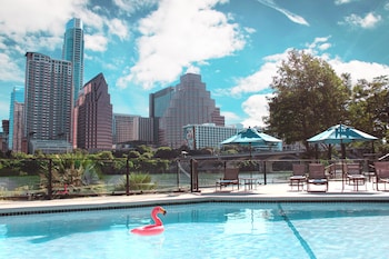 Outdoor pool, pool umbrellas, sun loungers