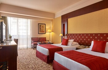 Deluxe Room | Premium bedding, minibar, in-room safe, desk