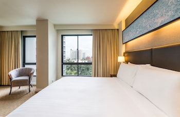 Deluxe 1-Bedroom King | Down comforters, free minibar, in-room safe, individually decorated