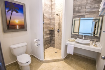 Premium Suite, 1 Bedroom, Oceanfront (Master) | Bathroom | Shower, eco-friendly toiletries, hair dryer, towels