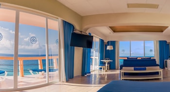 Deluxe Room with Balcony Ocean View | In-room safe, individually decorated, individually furnished