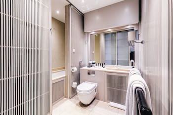 Double Room | Bathroom | Designer toiletries, hair dryer, bathrobes, slippers