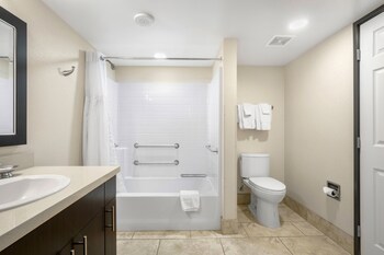 Suite, 1 King Bed, Multiple View | Bathroom | Free toiletries, hair dryer, towels