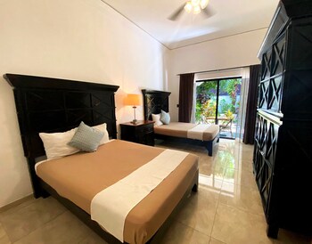 Quadruple Room, Poolside | Premium bedding, in-room safe, individually decorated