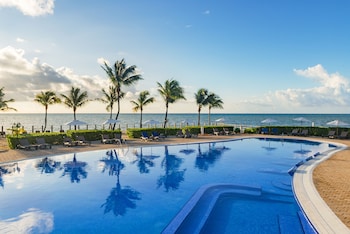 2 outdoor pools, pool umbrellas