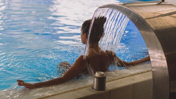 Indoor pool, outdoor pool, pool umbrellas, sun loungers