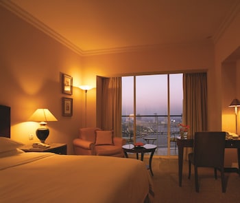 Grand Room with Nile View | 1 bedroom, minibar, in-room safe, individually decorated