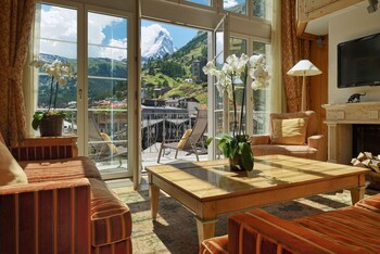 Alpine Suite, Matterhorn View | Living area | TV, toys, pay movies