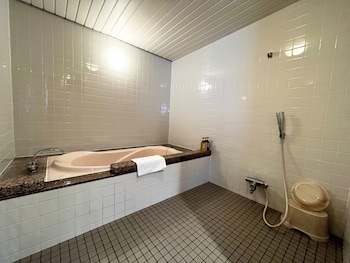 Japanese Western-Style Room, Non Smoking | Bathroom | Combined shower/tub, free toiletries, hair dryer, slippers