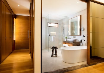 Suite, 1 Bedroom | Bathroom | Separate tub and shower, eco-friendly toiletries, hair dryer, bathrobes