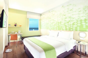 Deluxe Room, Pool Access | In-room safe, desk, laptop workspace, blackout drapes