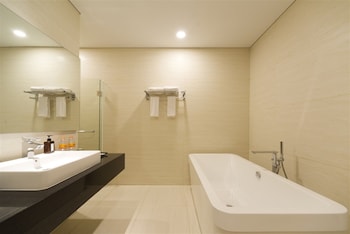 Luxury Suite, 2 Bedrooms | Bathroom | Shower, free toiletries, hair dryer, bathrobes