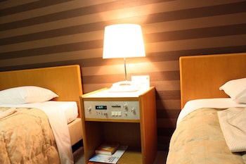 Standard Twin Room | Desk, blackout drapes, iron/ironing board, free WiFi