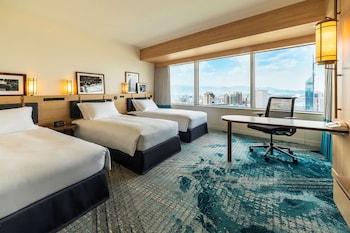 Room (Triple Premium Deluxe) | 1 bedroom, down comforters, minibar, blackout drapes