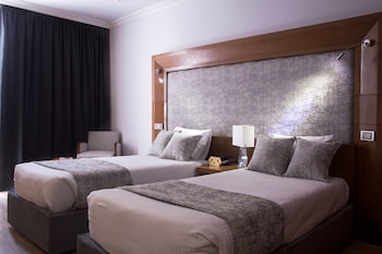 Deluxe Room | Select Comfort beds, in-room safe, rollaway beds, WiFi