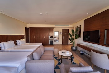 Deluxe Family Room | 2 bedrooms, minibar, in-room safe, desk