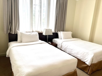 Deluxe Apartment, 3 Bedrooms | Minibar, in-room safe, desk, iron/ironing board