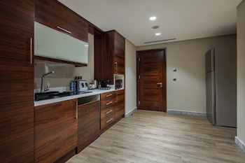 Presidential Suite, 1 King Bed, Smoking | Private kitchenette | Fridge, coffee/tea maker, cookware/dishes/utensils