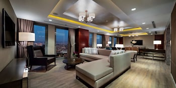 Presidential Suite, 1 King Bed, Smoking | Living area | LCD TV