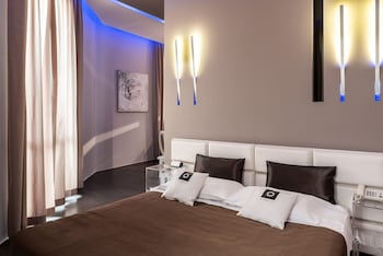 Luxury Suite, 1 Bedroom, Balcony | Frette Italian sheets, premium bedding, down comforters