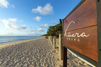 Private beach, white sand, sun loungers, beach umbrellas
