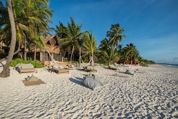 On the beach, sun loungers, beach umbrellas, beach towels