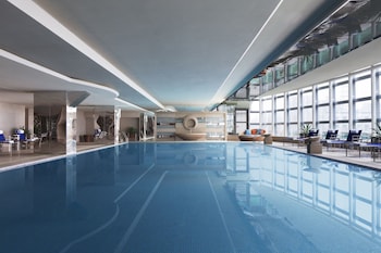 Indoor pool, open 9:00 AM to 9:00 PM, sun loungers