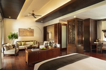 Anantara Suite | Living area | 60-inch flat-screen TV with cable channels, TV, DVD player