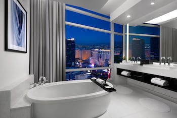 Sky Suites One Bedroom Penthouse - Strip View | Bathroom | Separate tub and shower, deep soaking tub, free toiletries, hair dryer