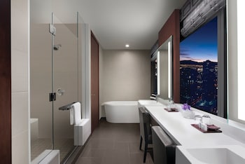 One Bedroom Penthouse Suite | Bathroom | Separate tub and shower, deep soaking tub, hair dryer, bathrobes