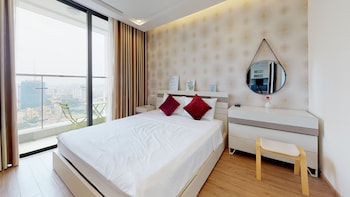 Deluxe Apartment, 3 Bedrooms | Premium bedding, in-room safe, blackout drapes, iron/ironing board