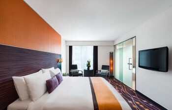 Deluxe Room | Premium bedding, minibar, in-room safe, blackout drapes