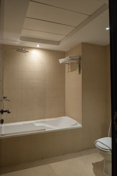 Separate tub and shower, rainfall showerhead, designer toiletries