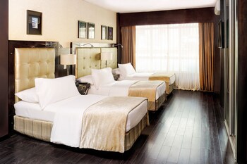 Superior Triple Room | Down comforters, minibar, in-room safe, desk