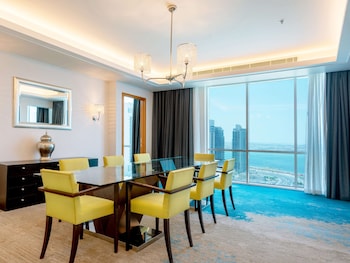 Presidential Suite (2 Bedrooms) | Living area | 32-inch LED TV with premium channels, TV