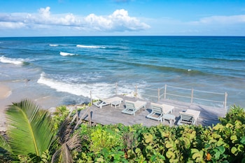 On the beach, sun loungers, beach umbrellas, beach towels