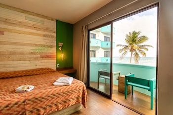 Room, 1 King Bed, Balcony, Partial Ocean View | Minibar, in-room safe, free WiFi, bed sheets