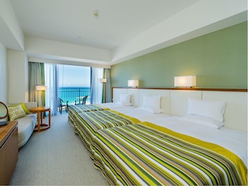 Deluxe High Floor Ocean Triple Room | Down comforters, in-room safe, free cribs/infant beds, free WiFi