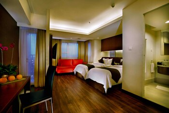 Deluxe Room | Premium bedding, pillowtop beds, minibar, in-room safe