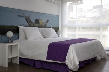 Suite 8° Piso | Down comforters, in-room safe, individually decorated