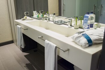 Deluxe Room | Bathroom | Shower, designer toiletries, hair dryer, bathrobes