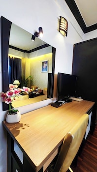 Superior Room | Living area | 32-inch LCD TV with cable channels, TV