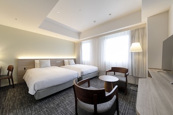 Deluxe Twin Room (Extra 85cm wide bed if booked by 3 adults) | In-room safe, laptop workspace, blackout drapes, free WiFi