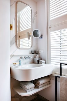 Luxury Room | Bathroom | Rainfall showerhead, eco-friendly toiletries, hair dryer, bathrobes